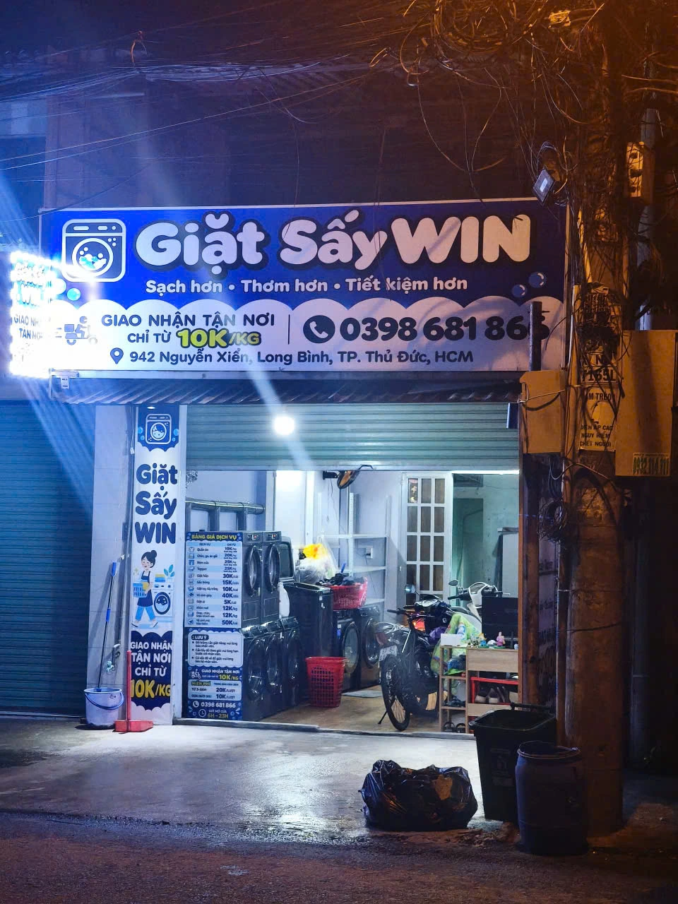 Mặt tiền thật của tiệm Giặt Sấy WIN tại 942 Nguyễn Xiển, Long Bình